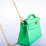 Hermès Kelly Pochette Vert Comics Swift Gold Hardware