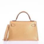 Hermès Rare Collectible Mini Kelly 20 Sellier Olympic Gold Metallic Doré Chevre Chamkilight Gold Hardware