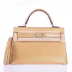 Hermès Rare Collectible Mini Kelly 20 Sellier Olympic Gold Metallic Doré Chevre Chamkilight Gold Hardware